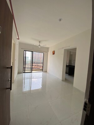 Building Lobby in 1.5 BHK Apartment at Runwal Gardens, Dombivli East – for Sale