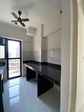 Kitchen in 1.5 BHK Apartment at Runwal Gardens, Dombivli East – for Sale