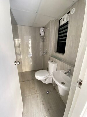 Bathroom in 2 BHK Apartment at Runwal Gardens, Dombivli East – for Rent