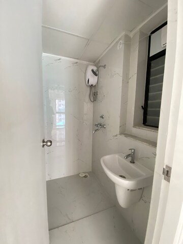 Bathroom in 1 BHK Apartment at Runwal Gardens, Dombivli East – for Rent