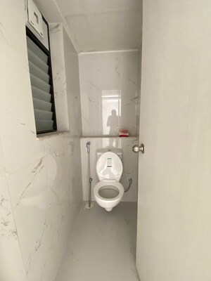 Bathroom in 1 BHK Apartment at Runwal Gardens, Dombivli East – for Rent