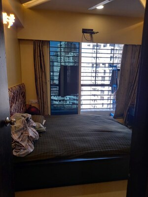 Bedroom in 1 BHK Apartment at Dosti Planet North Tower Elmore, Shilphata – for Sale