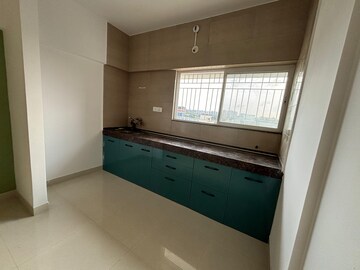 Kitchen in 1 RK Apartment at Gera Shrishti, Wagholi – for Rent