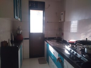 Kitchen in 1 BHK Apartment at Dosti Planet North Ruby, Shilphata – for Sale