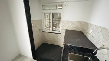 Kitchen in 2 BHK Builder Floor at Rahul Downtown, Punawale – for Sale