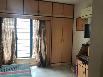 Bedroom in 2 BHK Apartment at Amrut Kalash CHS, Karve Road – for Rent