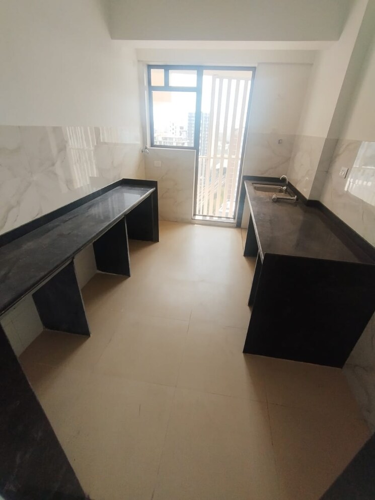 Kitchen, naman-habitat 2 Bedroom 807 Sq.Ft. Apartment In Andheri West Mumbai 9323424