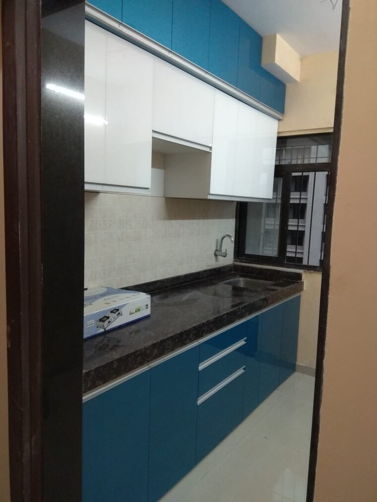 Kitchen, al-abraaj-central-empire 2 Bedroom 500 Sq.Ft. Apartment In Kausa Thane 9323421