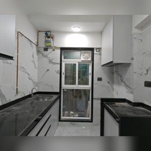 Kitchen in 3 BHK Apartment at Sanghvi Infenia, Santacruz East – for Rent