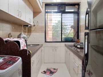 Kitchen in 2 BHK Apartment at Safal Shree Saraswati Phase 4, Chembur – for Rent