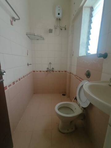 Bathroom in 2 BHK Apartment at Royal Pleasant Park CHS, Malad West – for Rent