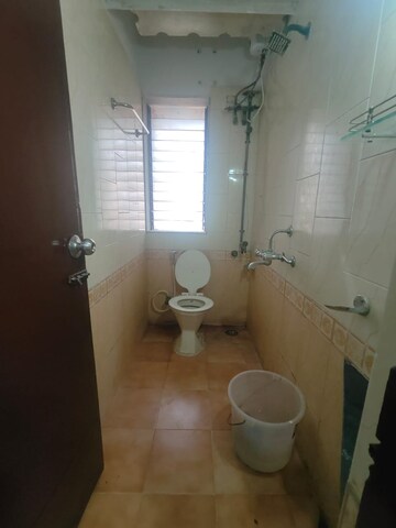 Bathroom in 2 BHK Apartment at Royal Pleasant Park CHS, Malad West – for Rent
