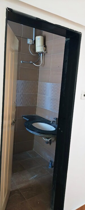 Bathroom in 2 BHK Apartment at Shiva Heights ll, Pimple Saudagar – for Rent