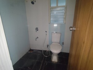 Bathroom in 1.5 BHK Apartment at GK Royale Rahadki Greens, Rahatani – for Rent