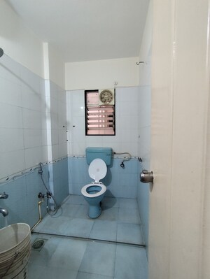 Bathroom in 2 BHK Apartment at GK Shiv Sai Vishwa, Pimple Saudagar – for Rent
