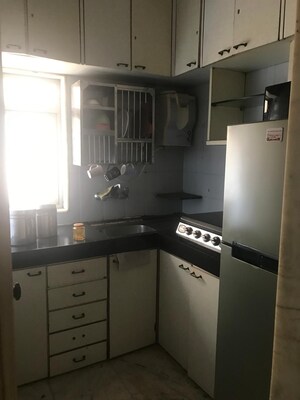 Kitchen in 1 BHK Apartment at Poornima Apartments, Colaba – for Rent