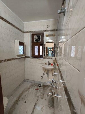 Bathroom in 4 BHK Apartment at Kalkaji – for Rent