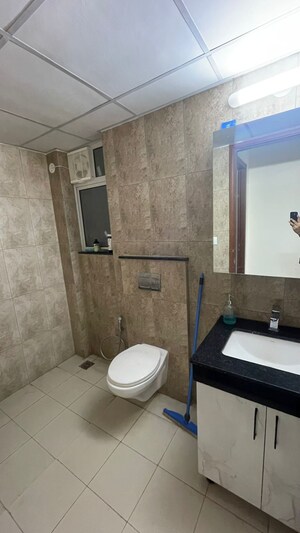 Bathroom in 3 BHK Apartment at Shapoorji Pallonji Joyville Phase 2, Sector 102 – for Rent