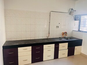 Kitchen in 2 BHK Apartment at Sanskriti Housing Society, Wakad – for Rent