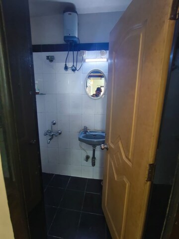 Master Bedroom in 2 BHK Apartment at Dheeraj Ganga, Malad West – for Rent