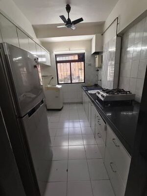 Kitchen in 2 BHK Apartment at Dheeraj Ganga, Malad West – for Rent
