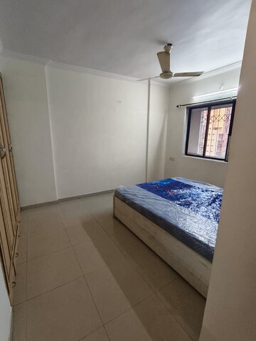 Bedroom in 2 BHK Apartment at Dheeraj Ganga, Malad West – for Rent