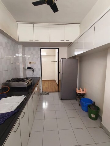 Kitchen in 2 BHK Apartment at Dheeraj Ganga, Malad West – for Rent