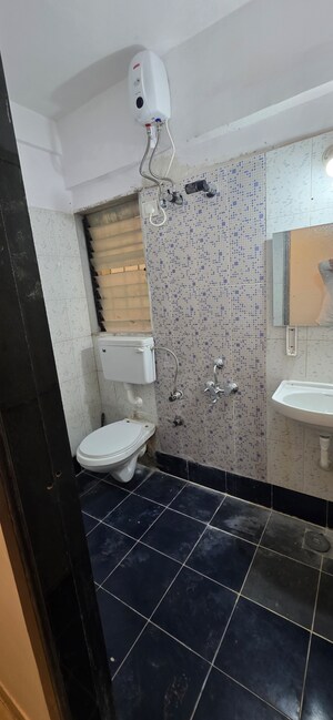 Bathroom in 2 BHK Apartment at HDIL Dheeraj Jamuna, Malad West – for Rent