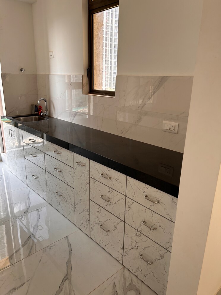 Kitchen, raymond-ten-x-habitat 2 Bedroom 635 Sq.Ft. Apartment In Pokhran Road No Two Thane 9323876