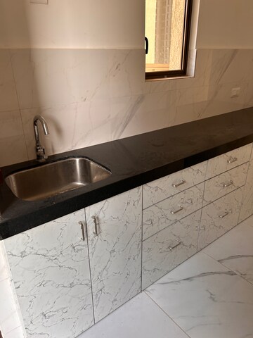 Kitchen in 2 BHK Apartment at Raymond Ten X Habitat, Pokhran Road No Two – for Rent
