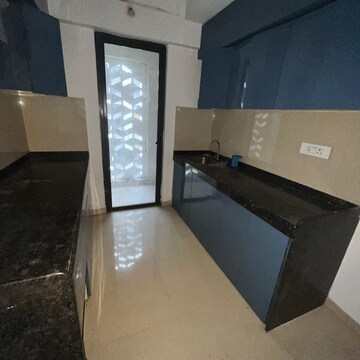 Kitchen in 2.5 BHK Apartment at Lodha Palava Clara A To D and D1, Taloja Bypass Road – for Rent