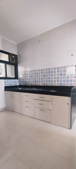 Kitchen in 2 BHK Apartment at Nanded City Pancham, Nanded – for Rent