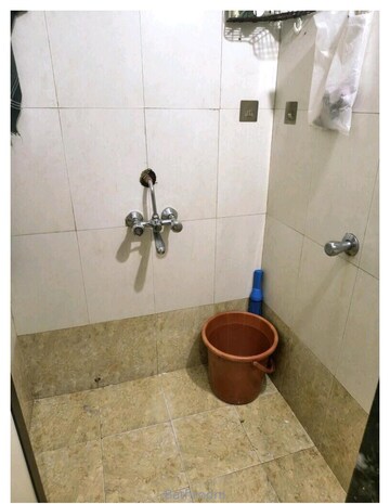 Bathroom in 1 BHK Apartment at Seawoods – for Sale