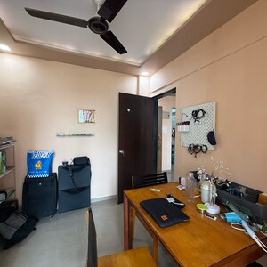 Living Room in 2 BHK Apartment at Seawoods – for Sale