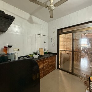 Kitchen in 2 BHK Apartment at Seawoods – for Sale