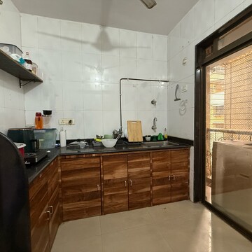 Kitchen in 2 BHK Apartment at Seawoods – for Sale