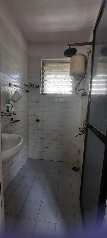 Bathroom in 1 BHK Apartment at Nobel House CHS, Andheri West – for Rent