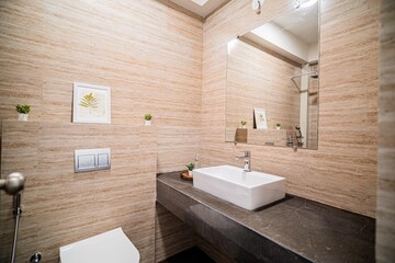Bathroom in 4 BHK Apartment at Raj Infinia, Malad West – for Sale