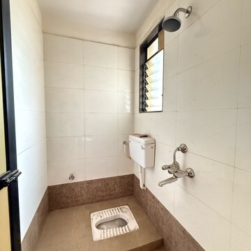 Bathroom in 2 BHK Apartment at Pushpak Nagar – for Sale