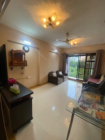 Living Room in 1 BHK Apartment at Ahuja Sea Crown, Kandivali West – for Rent