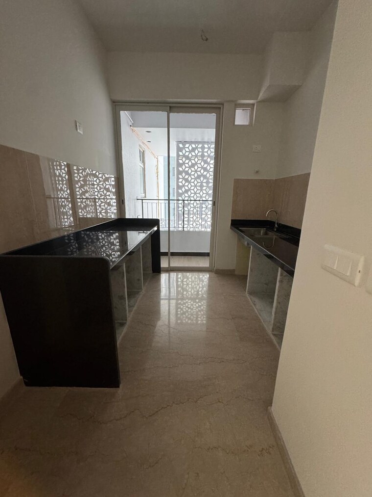 Kitchen, courtyard-by-narang-realty-and-the-wadhwa-group 2 Bedroom 830 Sq.Ft. Apartment In Pokhran Road No Two Thane 9324579