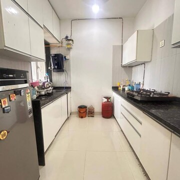 Kitchen in 2 BHK Apartment at Khan Palace Andheri West, Yari Road – for Rent