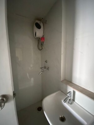 Bathroom in 1 BHK Apartment at Runwal Gardens Phase I, Dombivli East – for Rent
