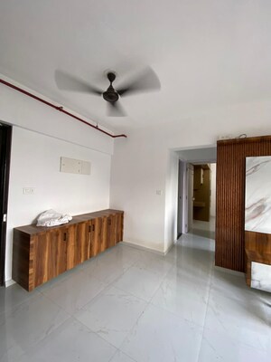 Living Room in 1 BHK Apartment at Runwal Gardens Phase I, Dombivli East – for Rent