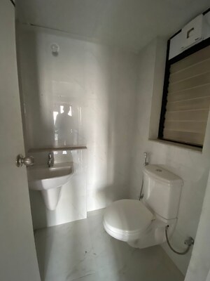 Bathroom in 1 BHK Apartment at Runwal Gardens Phase I, Dombivli East – for Rent