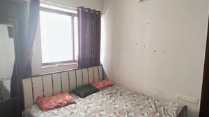 Bedroom in 1.5 BHK Apartment at Lodha Palava City Lakeshore Greens, Dombivli East – for Rent