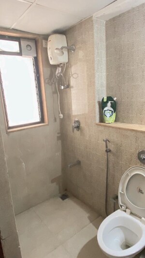 Bathroom in 1.5 BHK Apartment at Lodha Palava City Lakeshore Greens, Dombivli East – for Rent