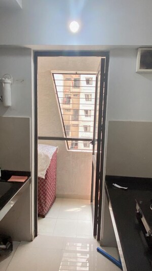 Kitchen in 1.5 BHK Apartment at Lodha Palava City Lakeshore Greens, Dombivli East – for Rent