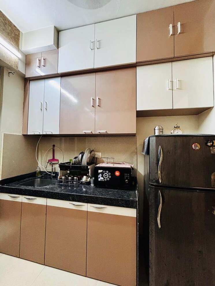 Kitchen, lodha-palava-eviva-k-to-t-urbano-a-c-f-and-i-to-t 1 Bedroom 404 Sq.Ft. Apartment In Dombivli East Thane 9324743