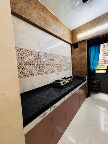 Kitchen in 1 BHK Apartment at Lodha Palava Eviva K To T Urbano A C F and I To T, Dombivli East – for Sale
